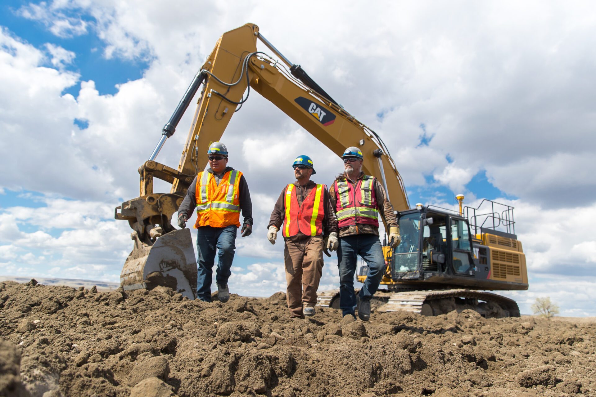 Construction workers at Bassano Dam